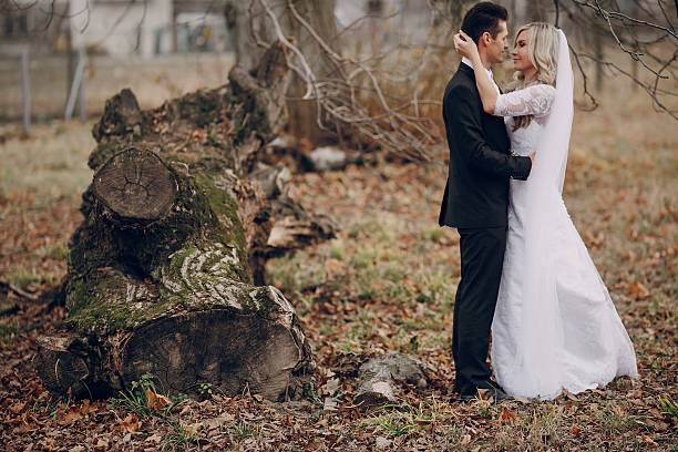 istock bride walking in golden autumn nature 470848632