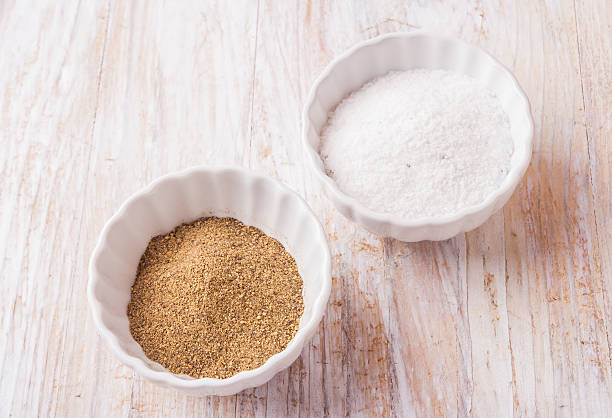 istock salt and pepper on wooden table 470850202
