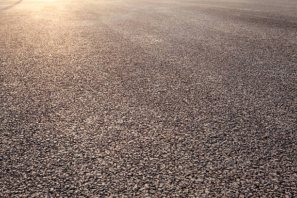 istock close-up new asphalt road 470850428