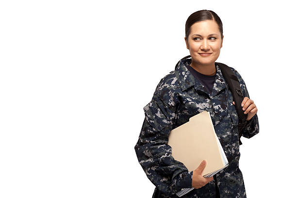 istock Female navy sailor with shoulder bag and books 470851184