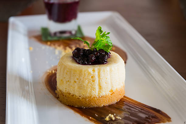 istock Blue berry cheese cake served with berry sauce 470851564