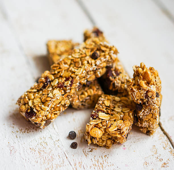 istock Granola bars on wooden background 470852531