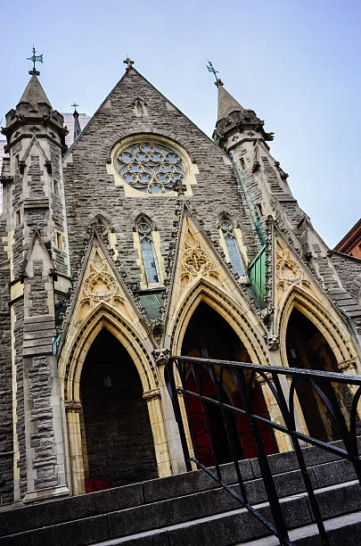 istock Catholic church gothic facade wide angle 470852618