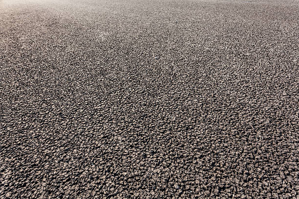 istock close-up new asphalt road 470855248