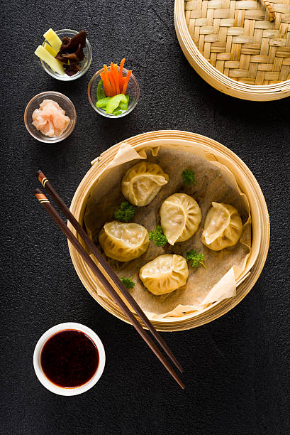 istock Dim sum dumplings in steamer and ingredients top view 470855396
