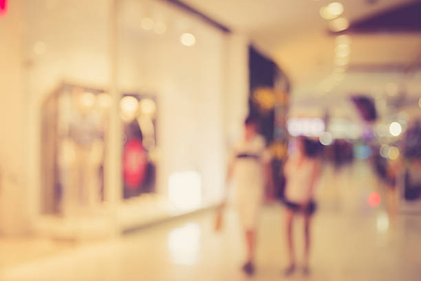 istock Blurred image of people in shopping mall with bokeh 470855746