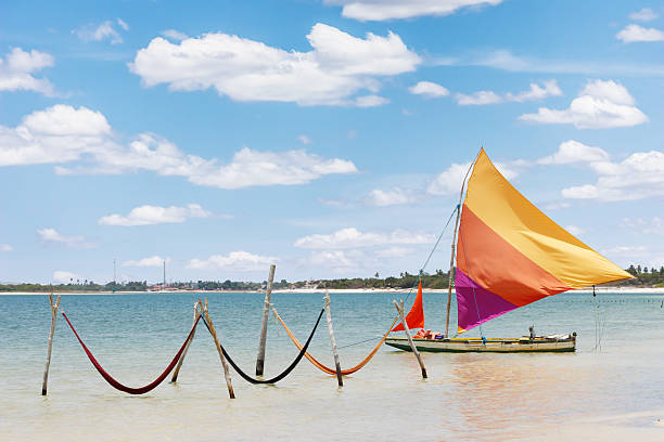 sail boat and hammocks at Jericoacoara, Brazil beautiful sail boat and hammocks at the Paradise Lake (Jericoacoara, Brazil) 2014 photos stock pictures, royalty-free photos & images