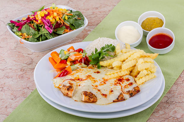 Bechamel Sauce and Cheese with Chicken ready to eat on dinner table