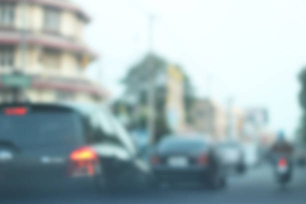 istock blurred of car on road 470857112