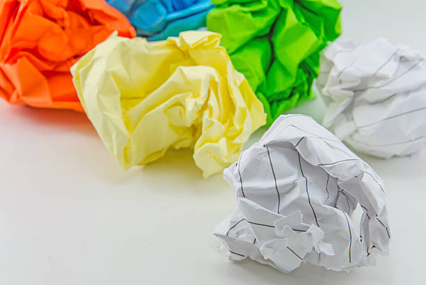istock Crumpled paper ball isolated on white background 470857740