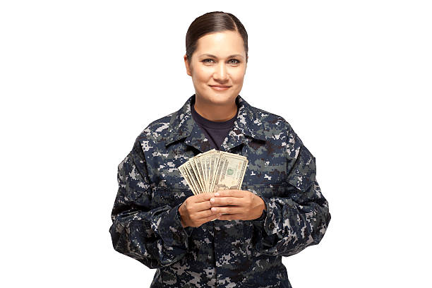 istock Female sailor with money 470858474