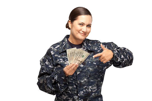 istock Female sailor showing money 470858480