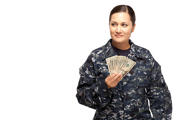 istock Female sailor with money looking away 470858490