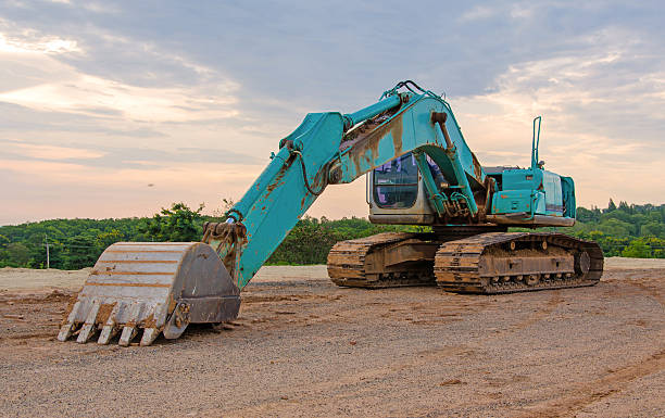 istock Excavator construction equipment park at worksite 470861560