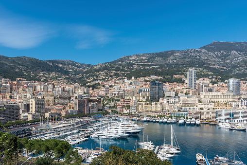 View from Monaco Ville across Port Hercule towards Monte Carlo on a sunny day.