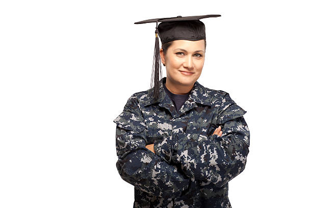 istock Female navy sailor with graduation cap 470869752