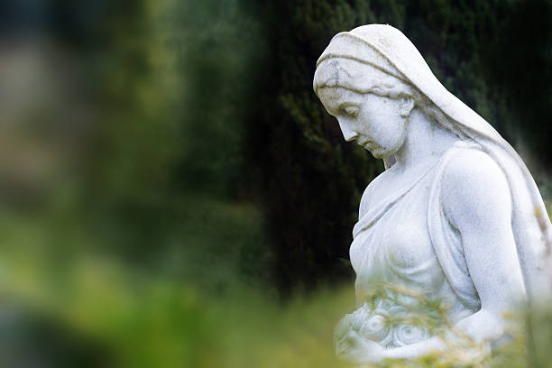 woman sculpture of marble in a park or cemetery woman sculpture with rose basket made of marble in a park or cemetery, copy space sistine madonna stock pictures, royalty-free photos & images