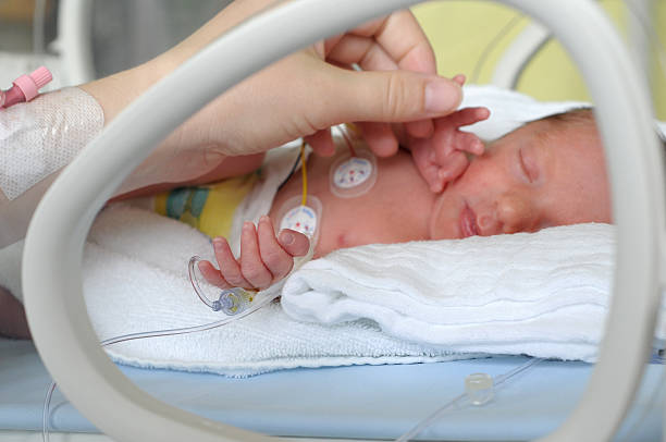 istock Newborn baby in incubator 470870038