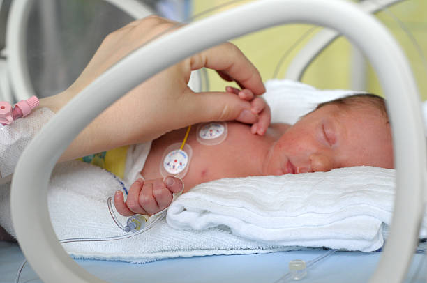 istock Newborn baby in incubator 470870040