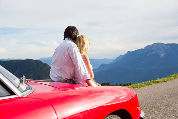istock Young couple relaxing on a cabriolet 470871517