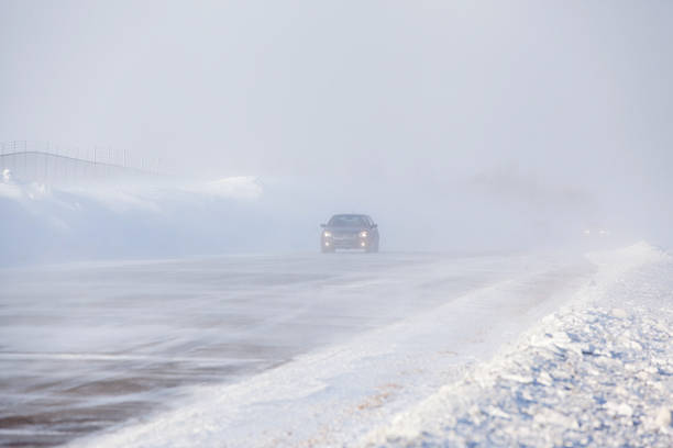 istock Winter Blizzard with Car on Highway 470872531