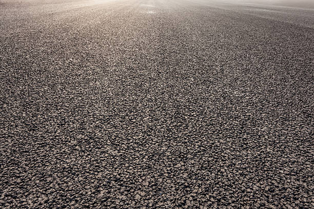 istock close-up new asphalt road 470873740