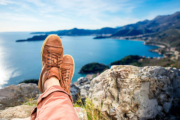 istock Men's legs on the mountain 470874526
