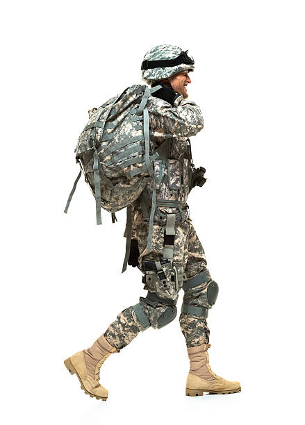istock Side view of smiling army walking 470877251