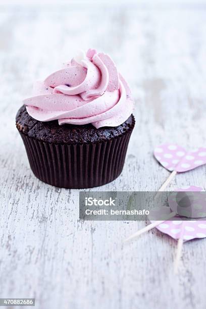 Pink Chocolate Cupcake Stock Photo - Download Image Now - 2015, Backgrounds, Cake