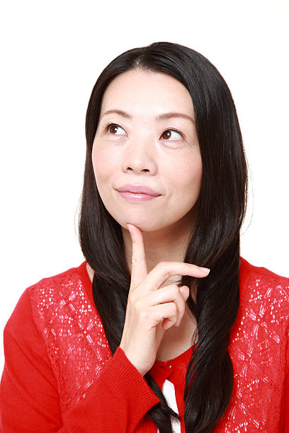 istock Japanese woman thinks about something 470885994