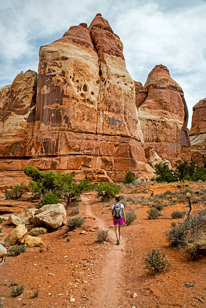 Woman Hiking in Canyonlands National Park stock photo