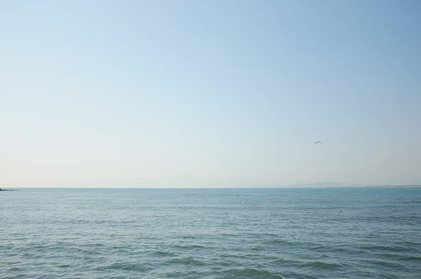 istock Calm sea ocean and blue clear sky background texture view 470894804
