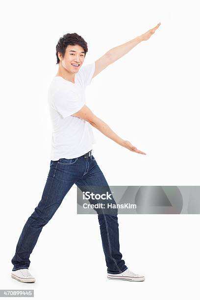 Asian Man Present Something Stock Photo - Download Image Now - Adult, Advertisement, Asian and Indian Ethnicities