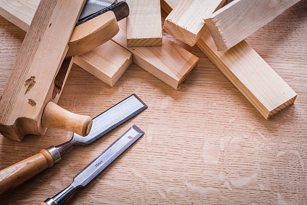 istock chisels woodworkers plane and planks on wooden board 470899682