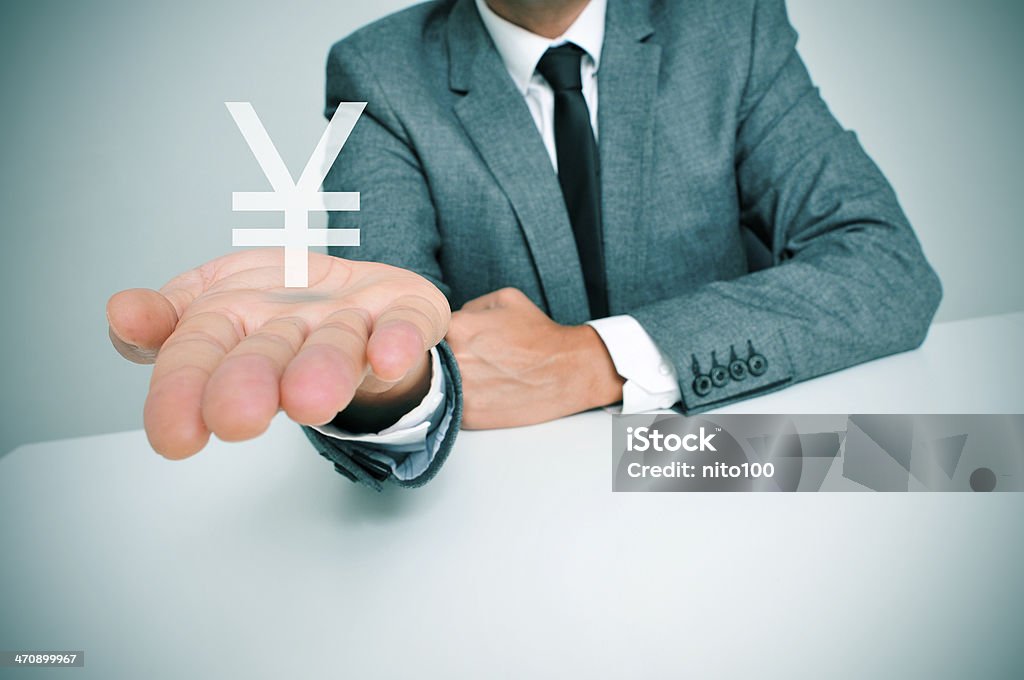 Empresário e yuan Chinês ou Símbolo de Iene Japonês - Royalty-free Abundância Foto de stock