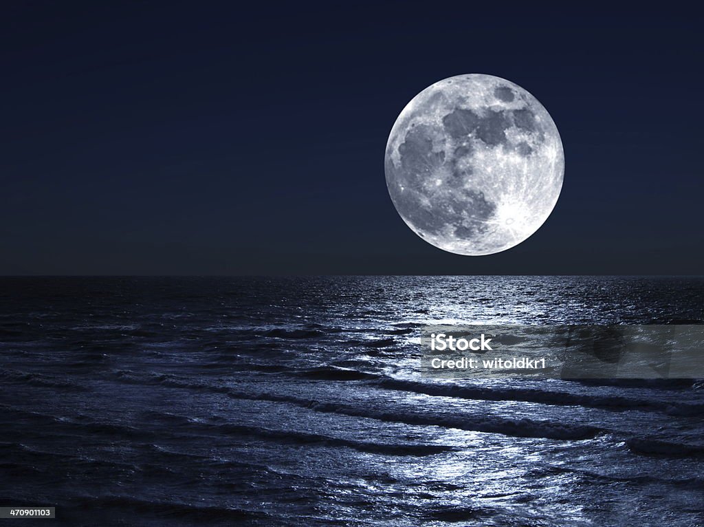 moon over sea moon and his reflection in water Moon Stock Photo