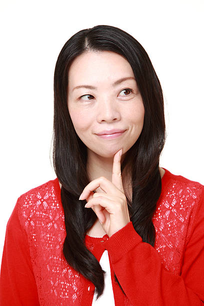 istock Japanese woman thinks about something 470903086