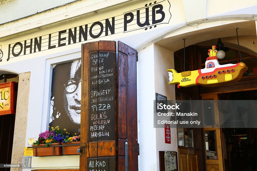 John Lennon pub in Prague Prague, Czech Republic - April 14, 2015: The exterior of John Lennon Pub, with an image of the famous musician. 2015 Stock Photo