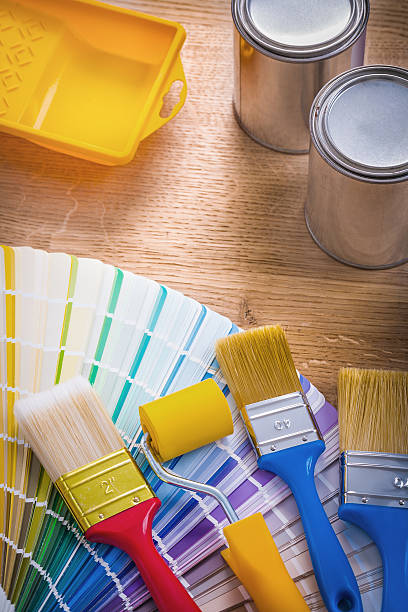 istock composition of painting tools paint brush roller tray can color 470906668