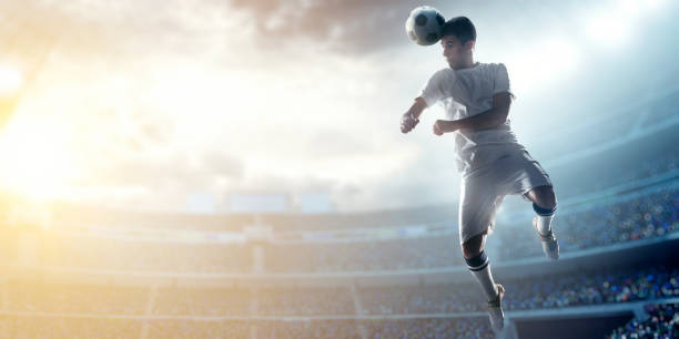 istock Soccer player kicking ball in stadium 470906966