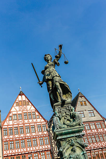 istock statue of Lady Justice in Frankfurt, Germany 470907570