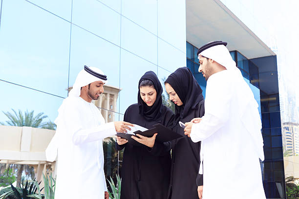 istock Four arab business people outside 470912400
