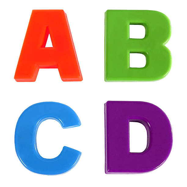 Alphabet written in multicolored plastic kids letters