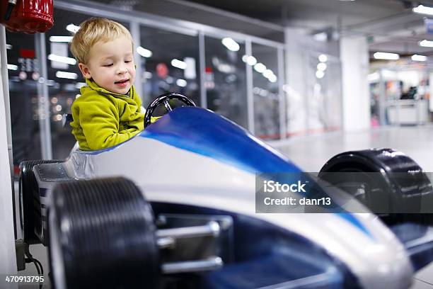 Little Boy Driving A Racing Car Stock Photo - Download Image Now - 12-17 Months, Boys, Car