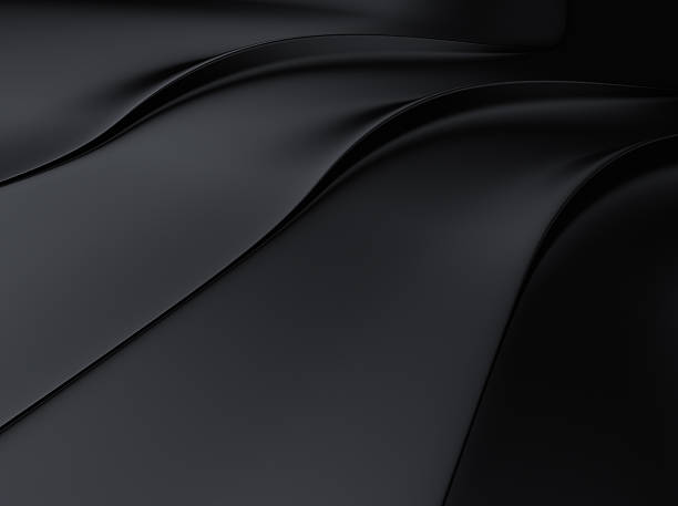 istock Three elegant folds of black metallic material 470914288