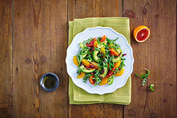 saudável salada marroquina - orange fruit portion multi colored - fotografias e filmes do acervo