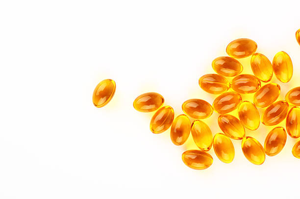 cápsulas de aceite de pescado - vitamin e lecithin nutritional supplement vitamin pill fotografías e imágenes de stock