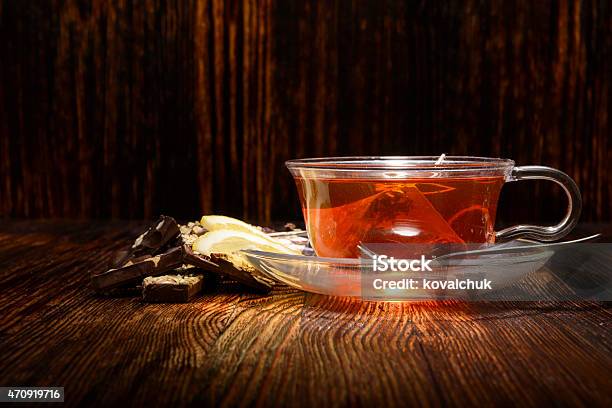 Cup Of Tea With Lemon On Wooden Background Stock Photo - Download Image Now - 2015, Black Tea, Cultures