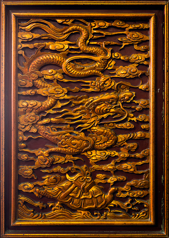 This is a dragon detail carved on the pagoda door in Vietnam