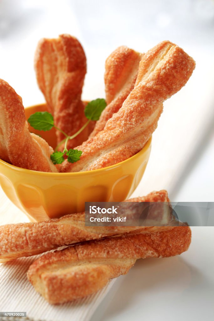 Puff pastry twists Puff pastry twists sprinkled with sugar Cinnamon Stock Photo